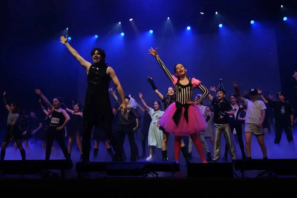 A rock number with a performer in a pink tutu